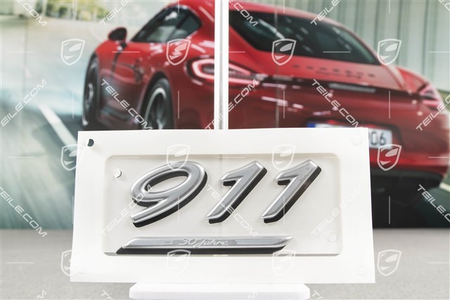 Napis "911 - 30 Jahre", srebrny