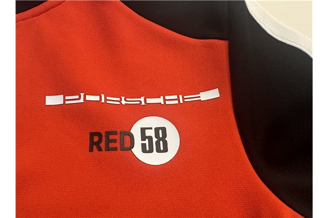 Men's red and black training jacket, size M